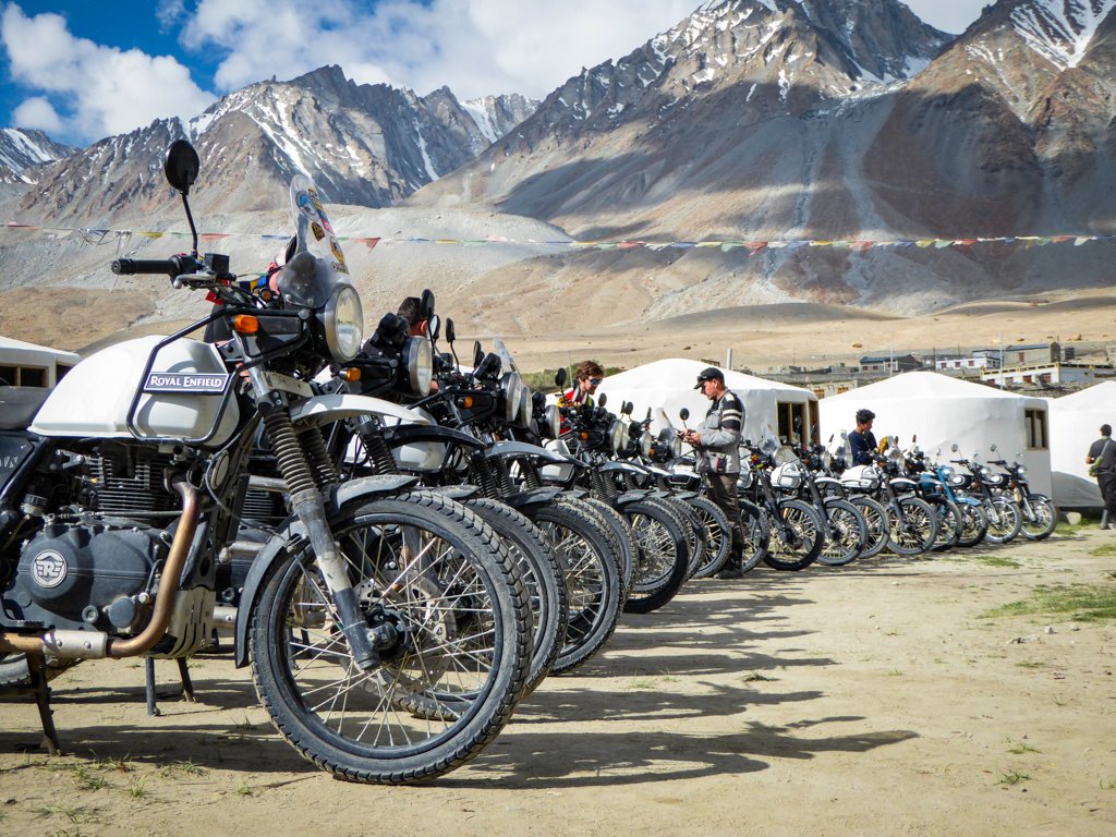 Riding through Ladakh's rugged terrain, soaking in crisp mountain air and thrilling vistas, creates an unforgettable biking adventure.