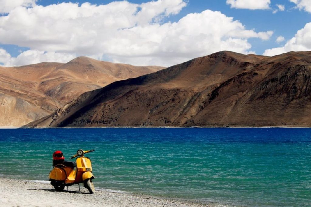 A mesmerizing high-altitude lake situated amidst the rugged terrain of the Himalayas, Pangong Lake is renowned for its ever-changing shades of blue and stunning panoramic views.